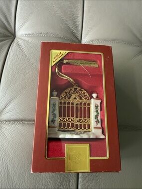 Lenox 2007 Gold and White Holiday Gate Ornament with Holly Pillars *